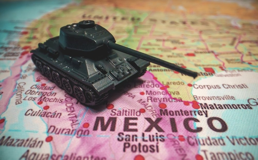 Toy tanks on the map. War on drug cartels in Mexico.