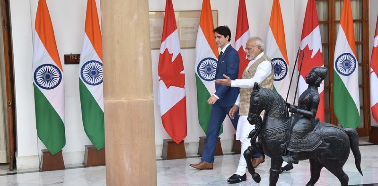 Trudeau and Modi Walking Down a Hall