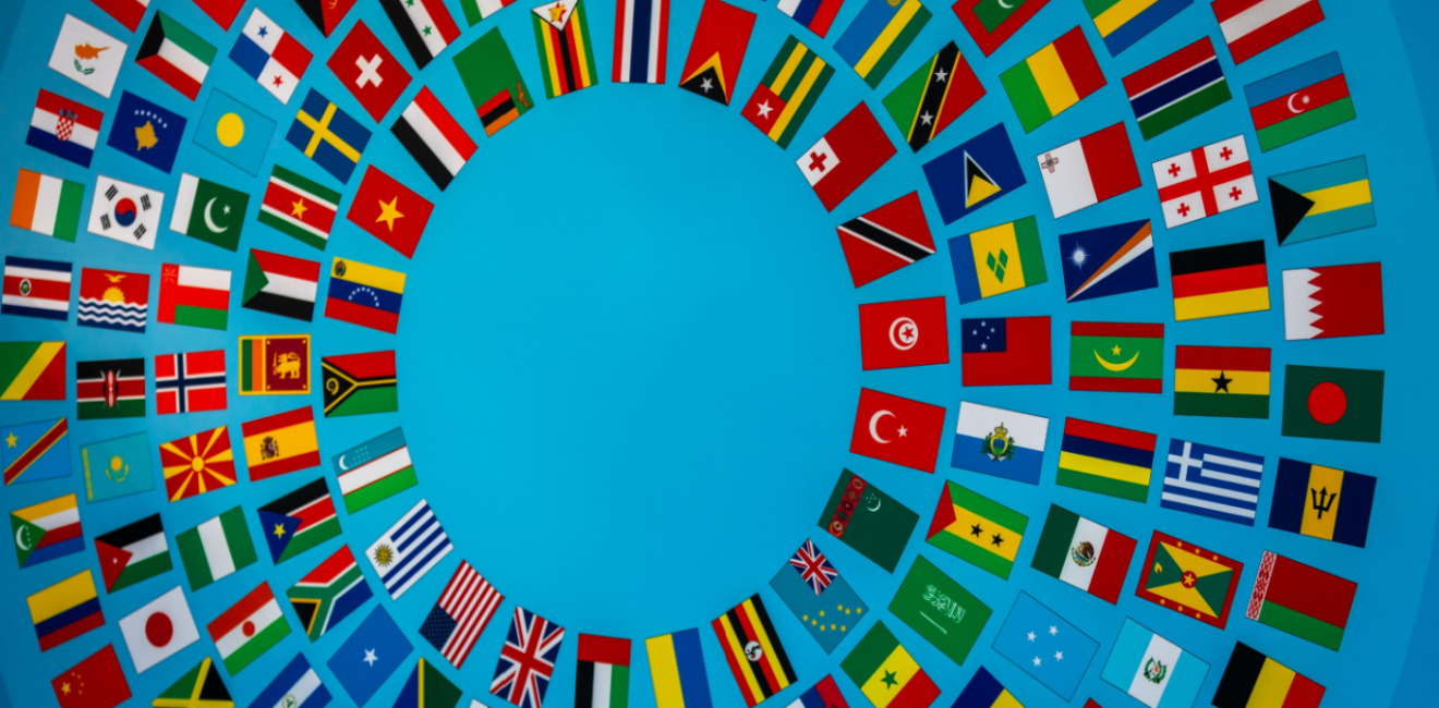 World Bank Group and International Monetary Fund Annual Meeting Logo with Flags Arranged in a Circle