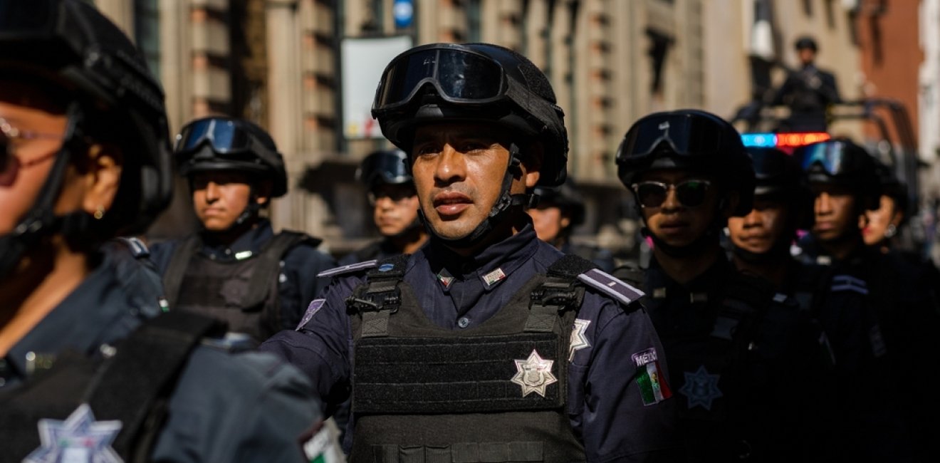 Puebla, Mexico - September 16, 2022: Puebla state police officers walk the streets in a surveillance operation