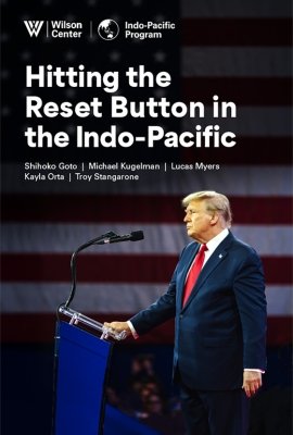 The cover of the publication featuring a photo of Donald Trump at a podium at an event.