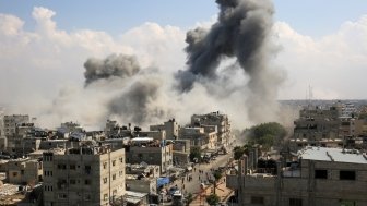 Smoke rises after Israeli air strikes of the city of Rafah in the southern Gaza Strip, October 10, 2023.