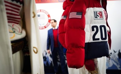 Marco Rubio looking at Team USA uniforms