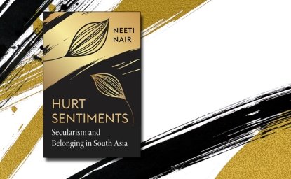 The book cover for Hurt Sentiments on a background with black and gold paint splashes.