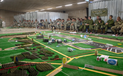 U.S. Army, Royal Canadian Regiment and Italian Esercito soldiers are briefed on the upcoming operations a part of Steadfast Javelin II on Rhein Ordnance Barracks, Germany, Sept. 3, 2014.