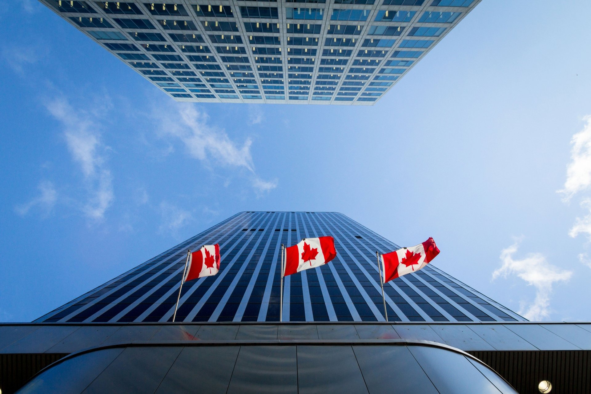 Canada flags looking up