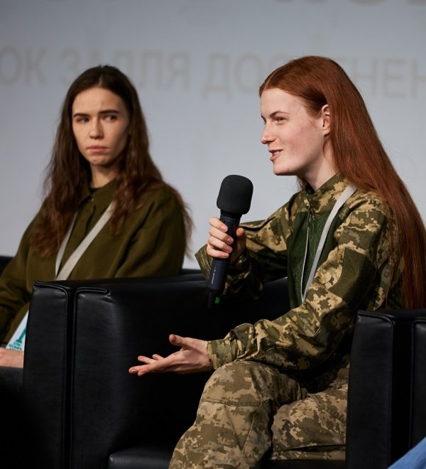 Oksana Rubaniak speaks at forum Arm Women Now in Kyiv