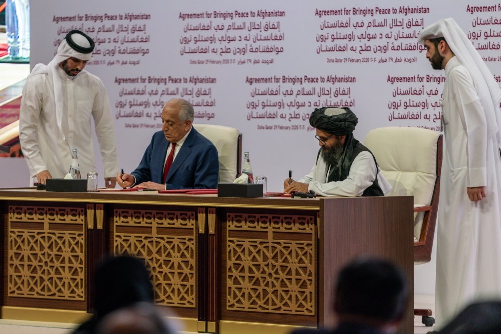 U.S. Special Representative for Afghanistan Reconciliation Ambassador Zalmay Khalilzad participates in a signing ceremony in Doha, Qatar. (DoS photo)