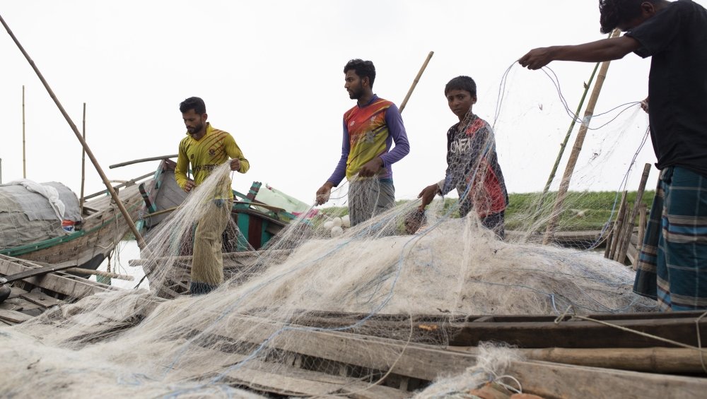 fishermen borrow boats from local businessmen in exchange for a share of their catch