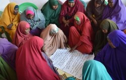 Women from conflicting clans in Somalia who have experienced years of conflict, marginalization and drought develop a plan for their district