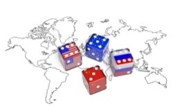 A  map of the world with dice representing the flags of the U.S., the EU, China, and Russia