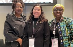 Speakers stand together at the Midwives in Humanitarian Settings Event
