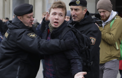 Belarus police detain journalist Roman Protasevich in Minsk, Belarus, Sunday, March 26, 2017. Dozens protestors were detained during attempt to rally in downtown Minsk. ﻿﻿(AP Photo/Sergei Grits)