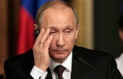 Photo of Putin with his hand on the side of his face