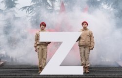 Soldiers standing with a large Z